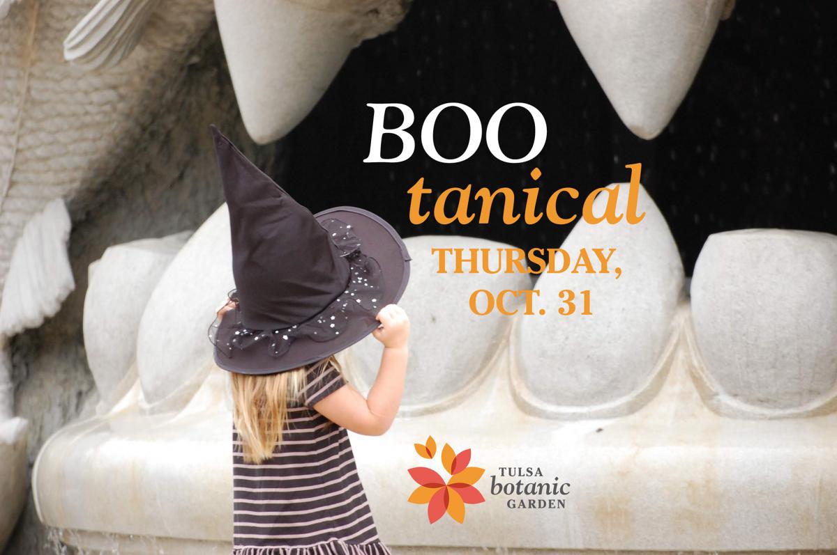 Boo-tanical girl in witch hat in Children's Discovery Garden